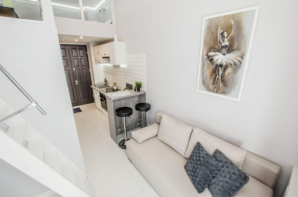 Signature Apartment | Living area | Flat-screen TV