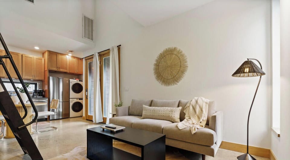 Beautiful living room with comfy sofa and smart tv