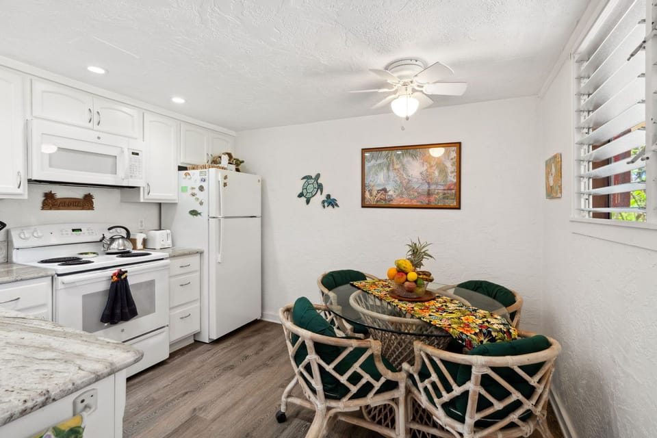 Enjoy meals at this dining table with seating for four