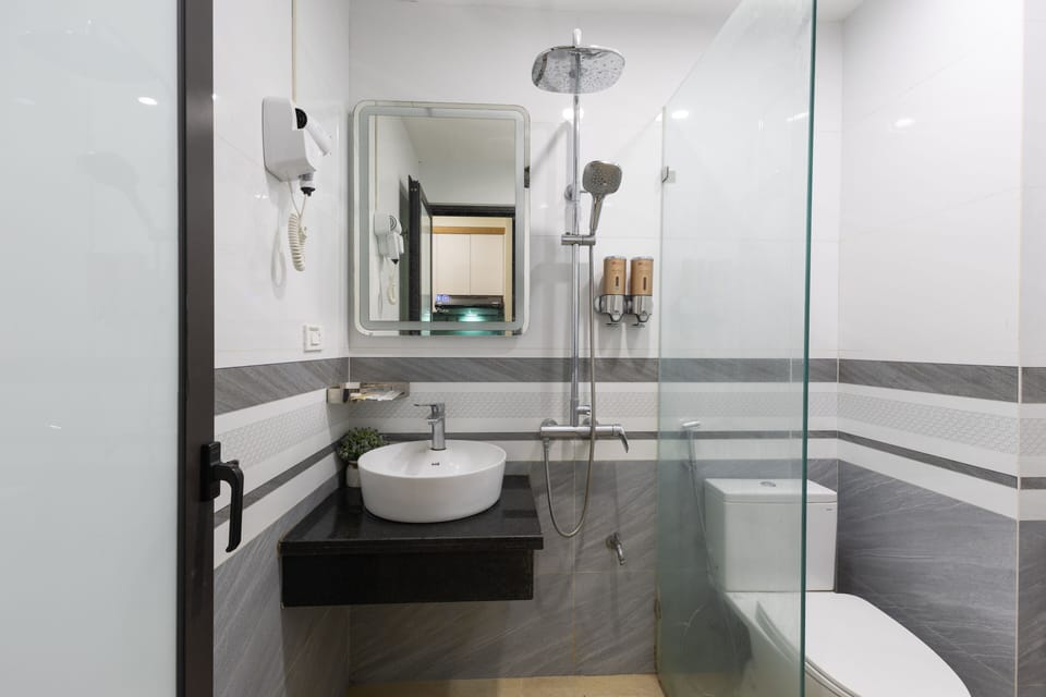 Deluxe Double Room, City View | Bathroom | Shower, hydromassage showerhead, free toiletries, slippers