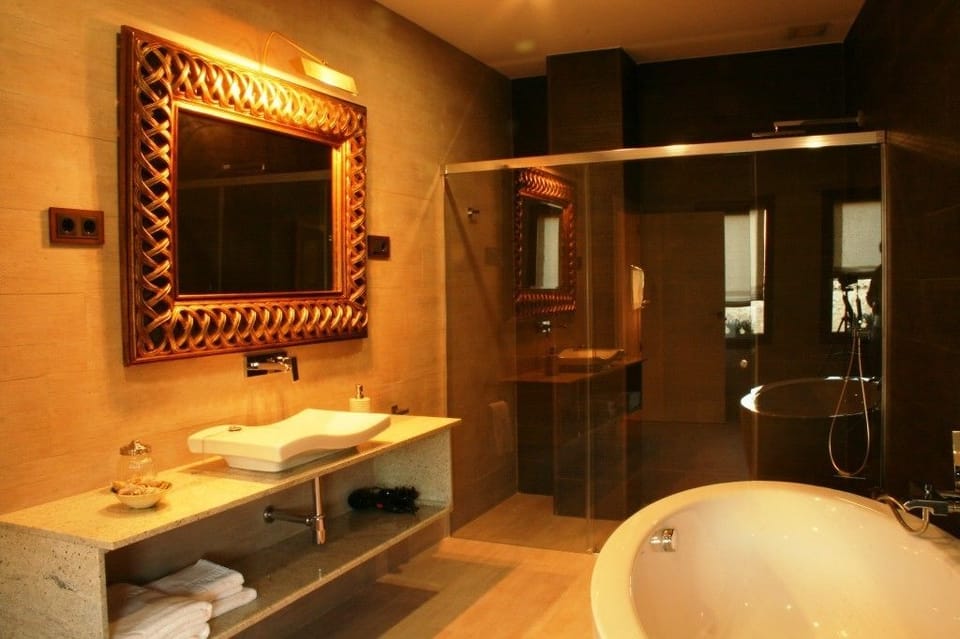 Suite | Bathroom | Separate tub and shower, hair dryer, slippers, bidet
