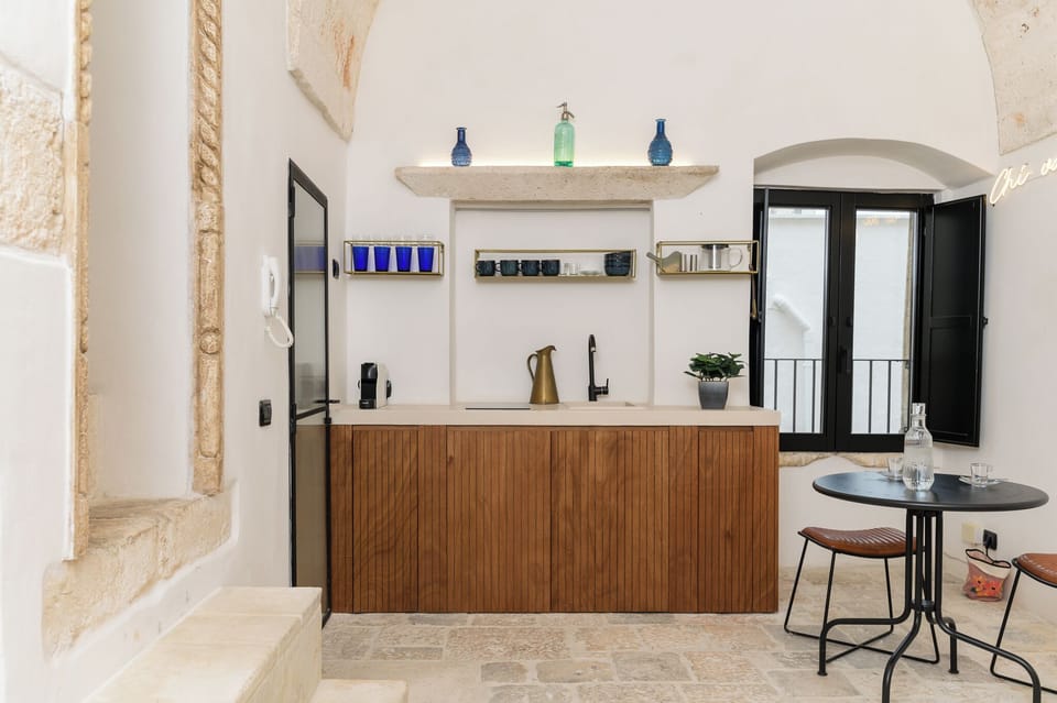 Apartment | Private kitchen | Espresso maker, dining tables