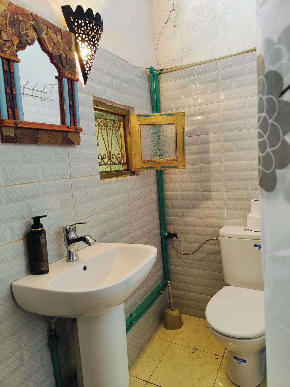 Shower, hair dryer (on request), slippers, towels
