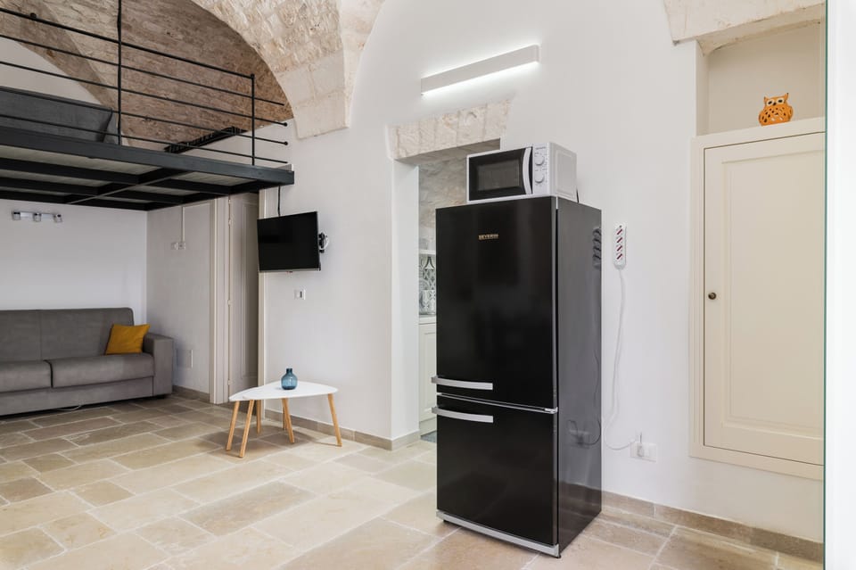 Apartment | Living area | 35-inch flat-screen TV with digital channels