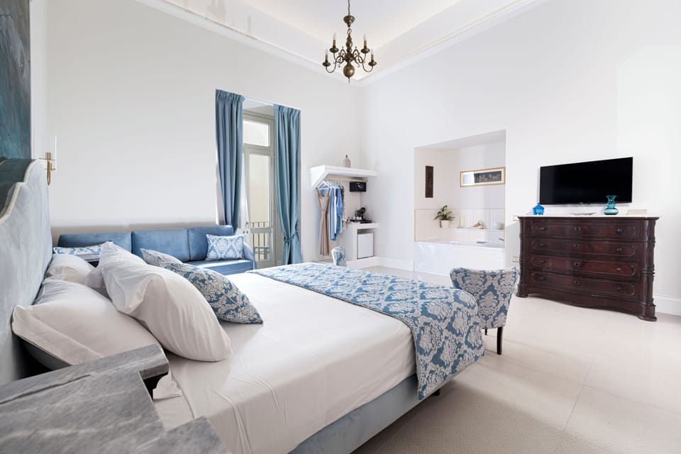 Premium bedding, down comforters, Select Comfort beds, free minibar