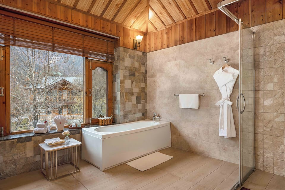 Suite, 1 Queen Bed (Grand Himalyan Suite) | Bathroom | Shower, hydromassage showerhead, free toiletries, hair dryer