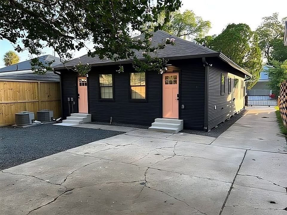 Back entrance with designated parking.