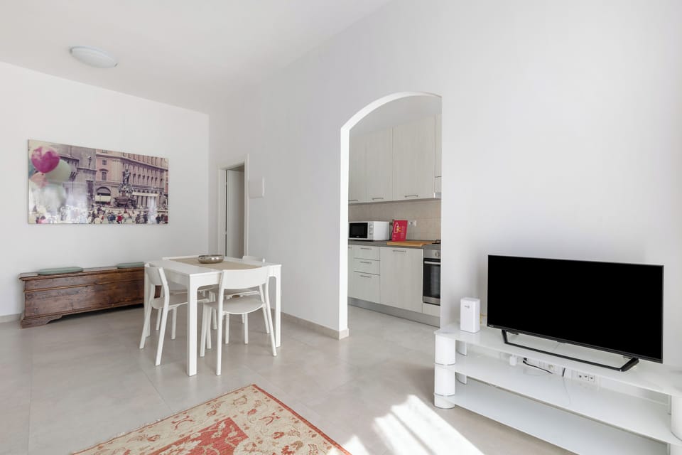 Apartment | Living area | 35-inch flat-screen TV with digital channels