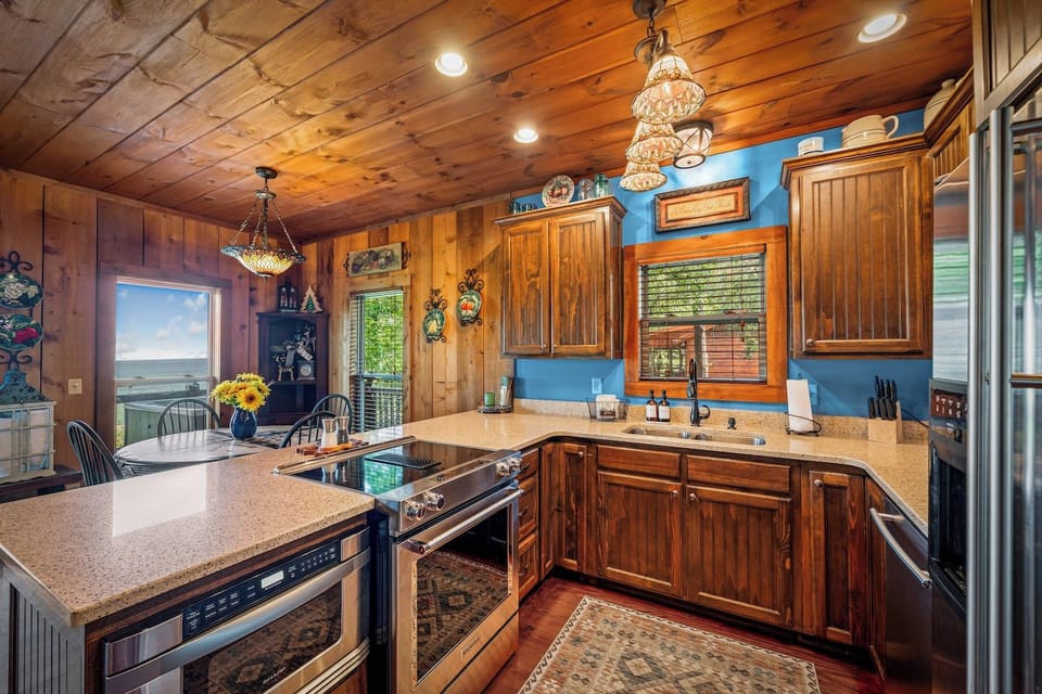 Well Stocked Kitchen with Stainless Steel Appliances. VIEWS while cooking!Kitchen Island Seats 4.
