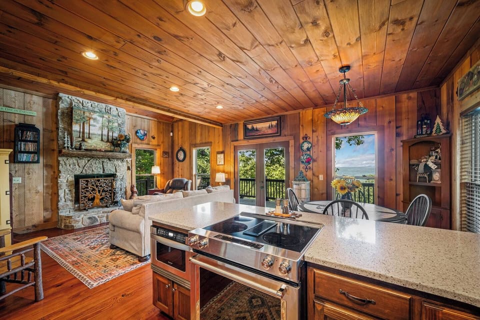 Cozy, Rustic Interior with Wood Burning Fireplace and Views From Every Seat.