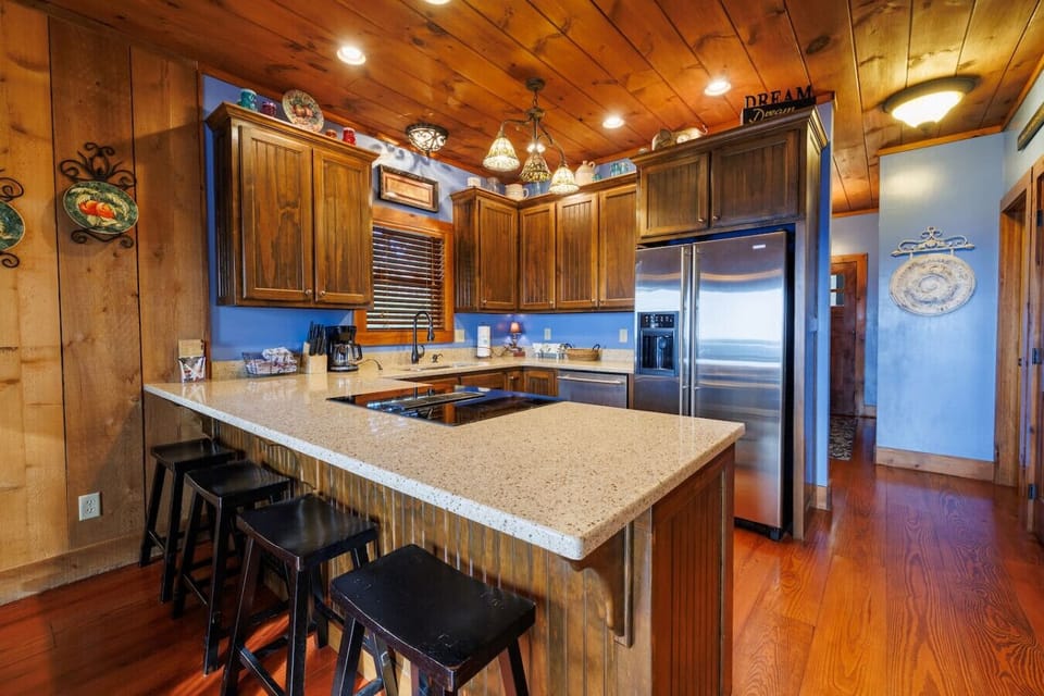 Well Stocked Kitchen with Stainless Steel Appliances. VIEWS while cooking!Kitchen Island Seats 4.