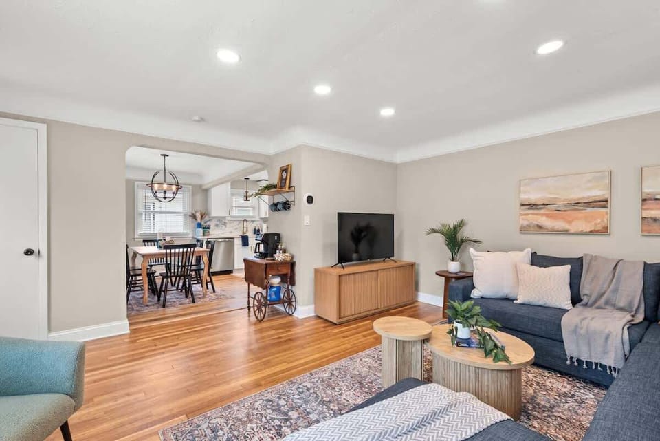Cozy living room w/ sofas, accent chairs & a relaxed, airy feel