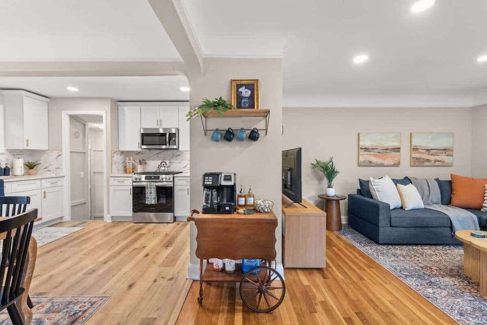 Open-concept living space flowing into kitchen & dining area
