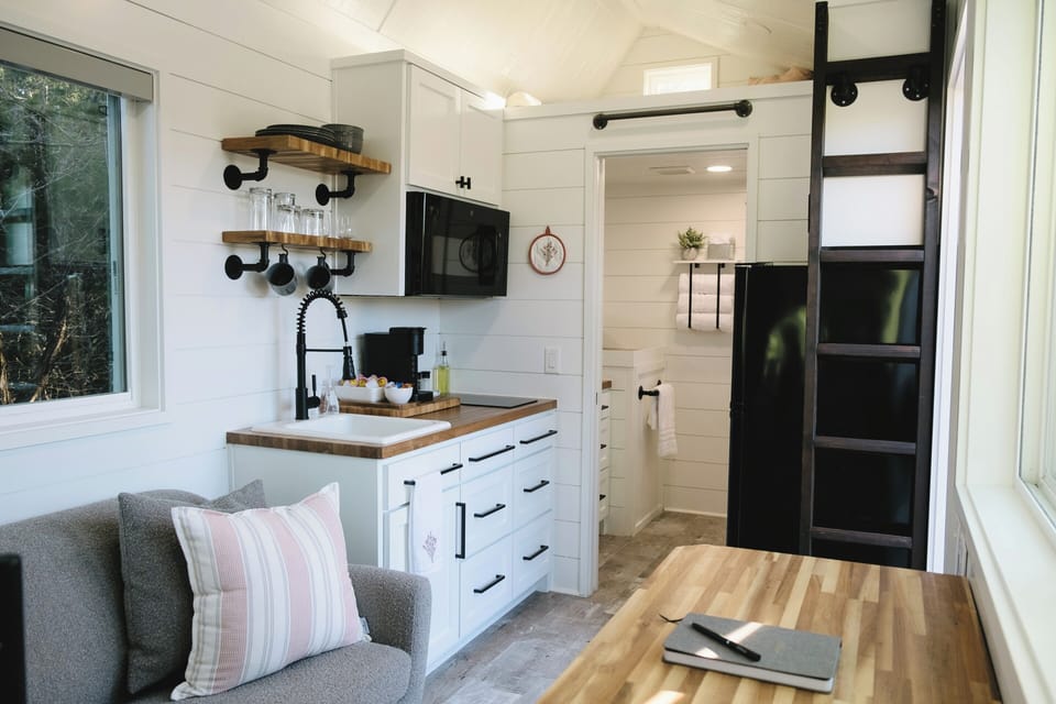 A view of the kitchen and living space.