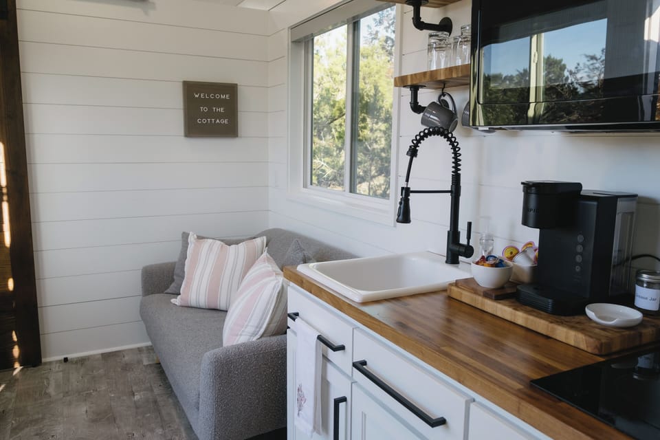 You'll love the modern and bright feel of the kitchen and living room.