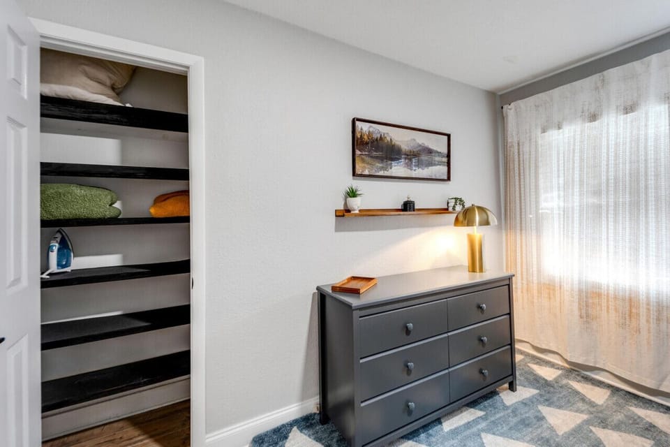 Fun and functional bunk room designed with kids in mind, featuring a twin-over-full bunk bed