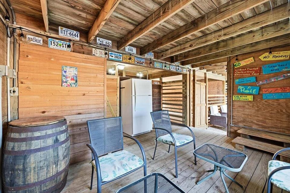 Covered Lounge with Refrigerator, Cabana Full Bathroom, and Outdoor Shower