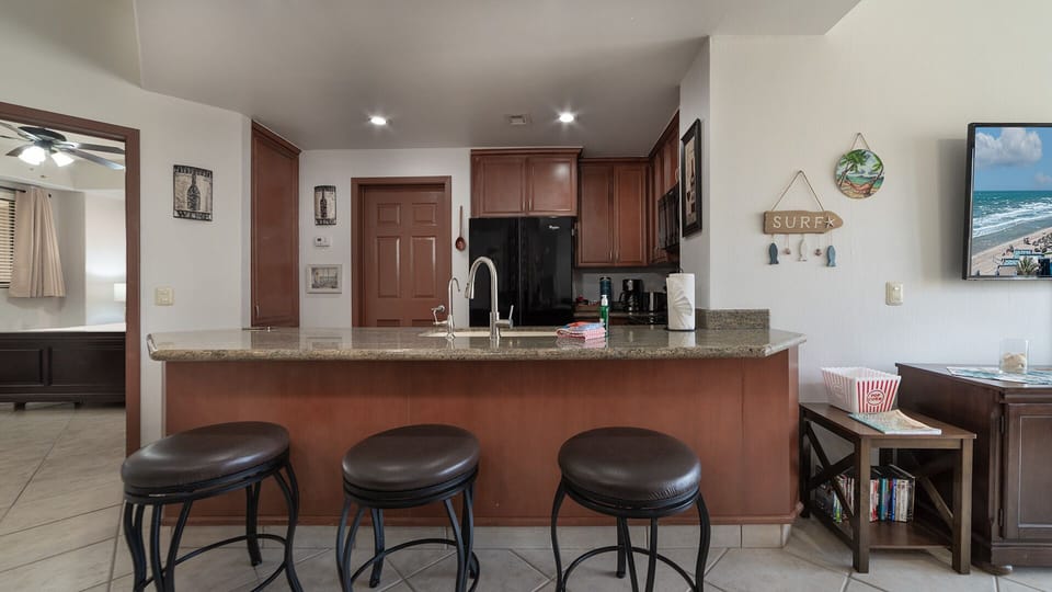 Seating at the kitchen counter.