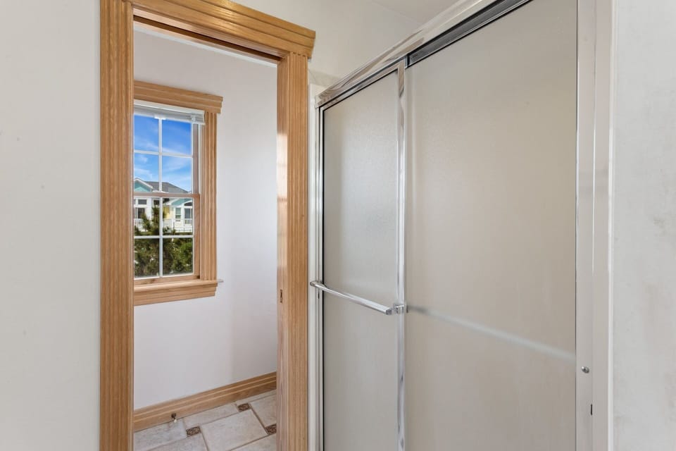 The Private Master Bedroom boasts a Whirlpool Tub and Shower for ultimate relaxation.