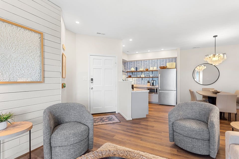 Relax in the spacious Living Area with a Flat Screen TV and lots of natural light.
