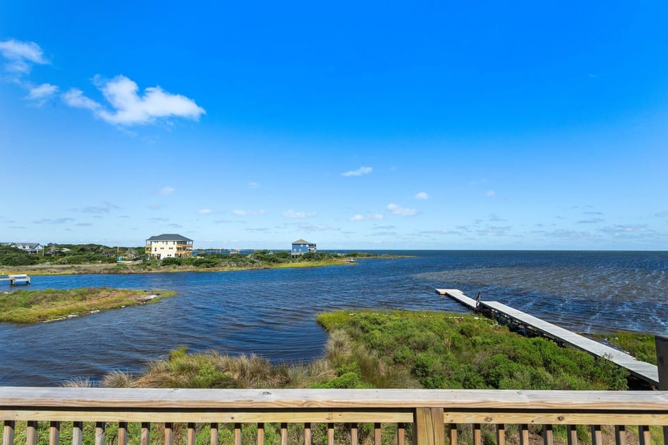 Step right out onto your private deck and enjoy beautiful sunsets over the sound as you relax with cozy cocktail seating.