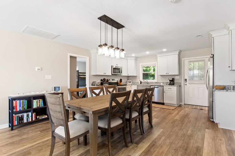 The nearby dining area is perfect for a meal as a family.