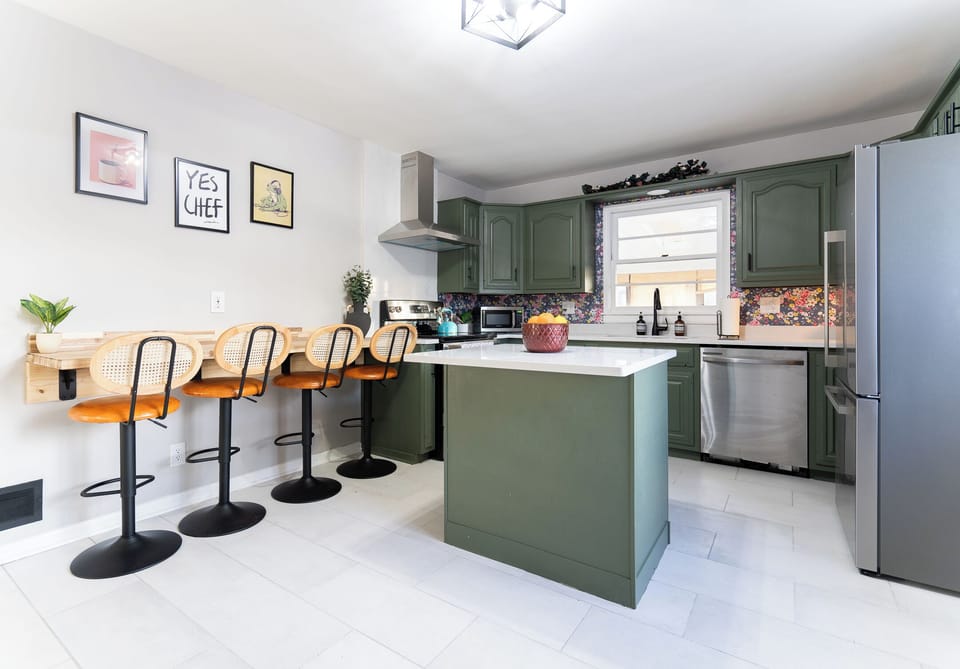 1 of 2 stocked kitchens on the main level, ideal for group meals & long stays