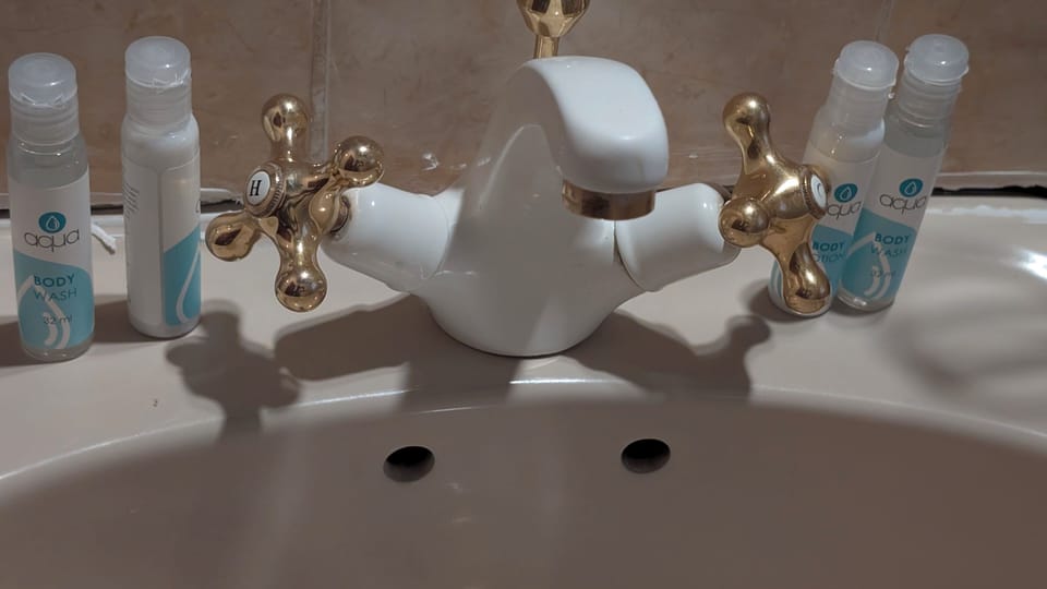 Standard Bedroom 5 Sleeper | Bathroom | Shower, rainfall showerhead, free toiletries, towels