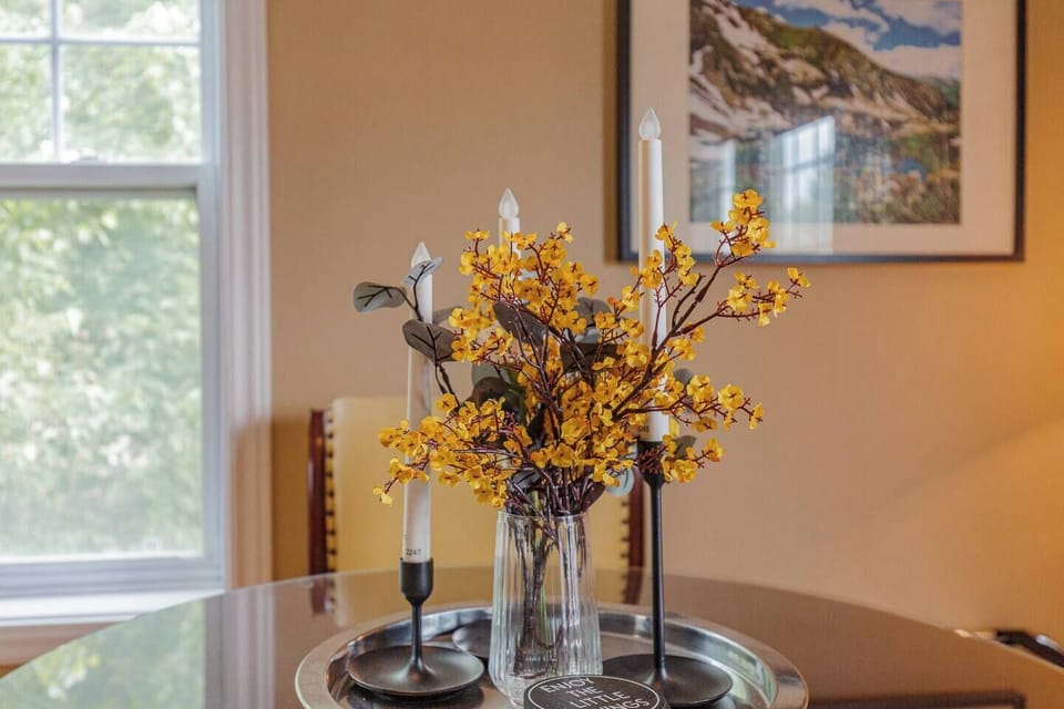 Elegant dining area with round glass table