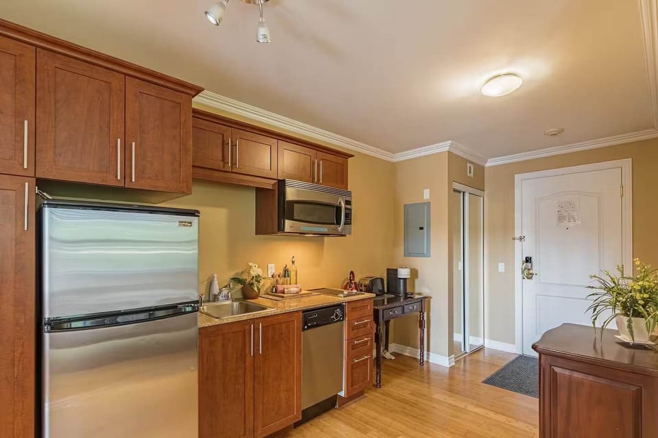 Bright kitchen space with appliances and ample storage