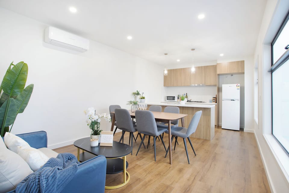 Upstairs open plan kitchen, dining and seating area
