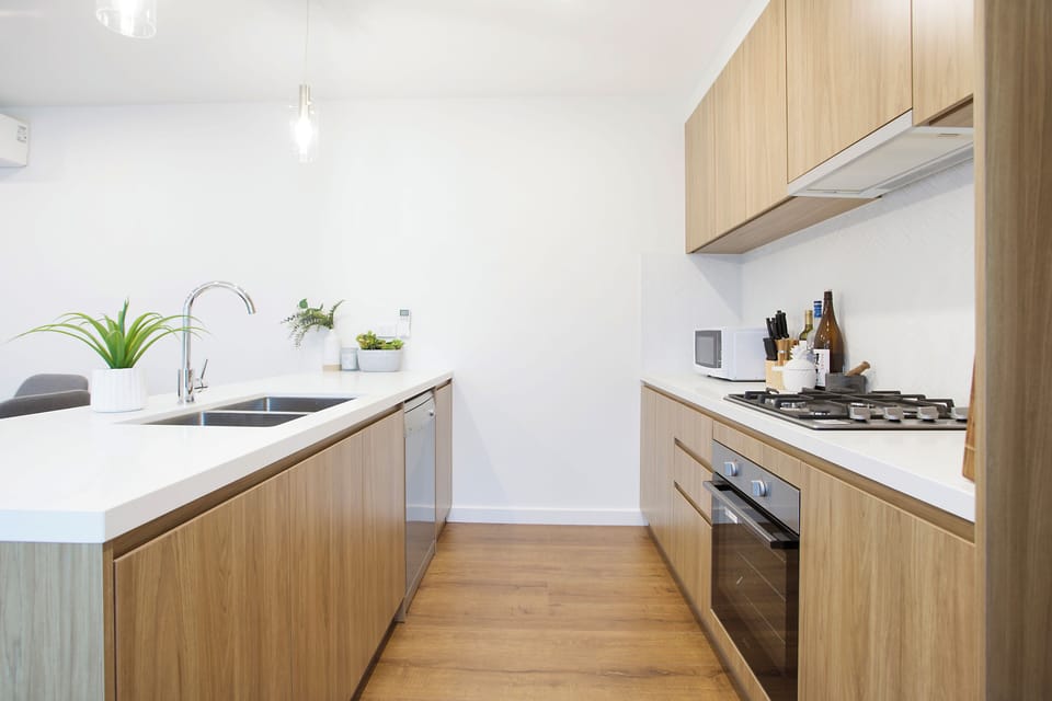 Bright and well lit kitchen with all your kitchen needs