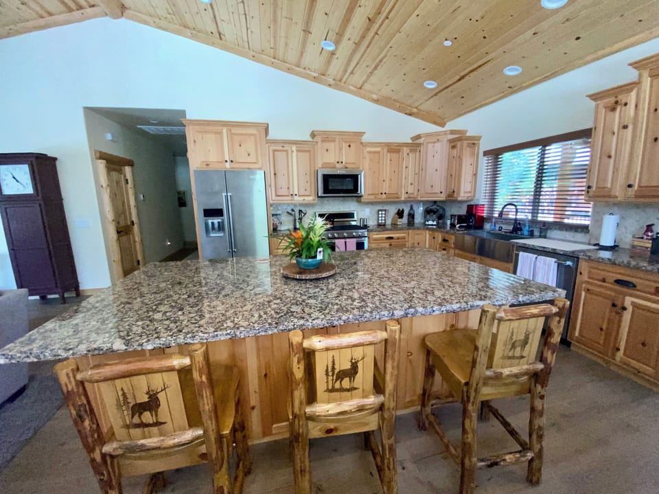 Bar stools add extra eating space in the dining area.
