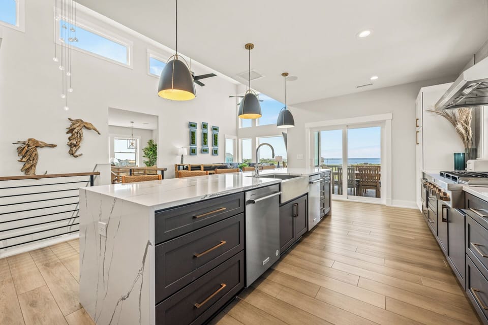 Gourmet Kitchen with Bar Seating and Sound Views on Fourth Level