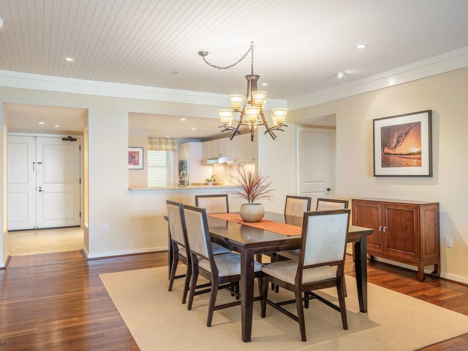 The dining area opens to the kitchen as well.