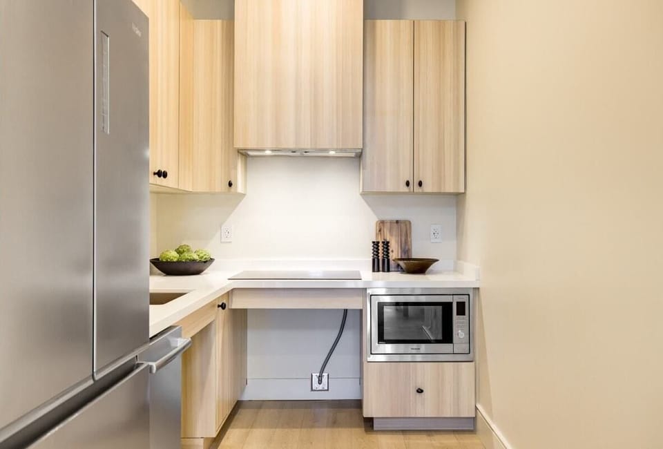 Kitchenette with Nespresso Coffee Machine and full Fridge - No Stove