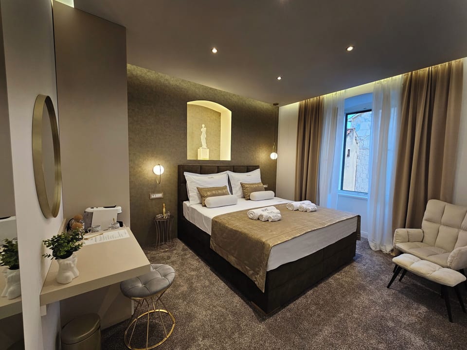 Deluxe Double Room, Partial Sea View | In-room safe, blackout drapes, soundproofing, free WiFi