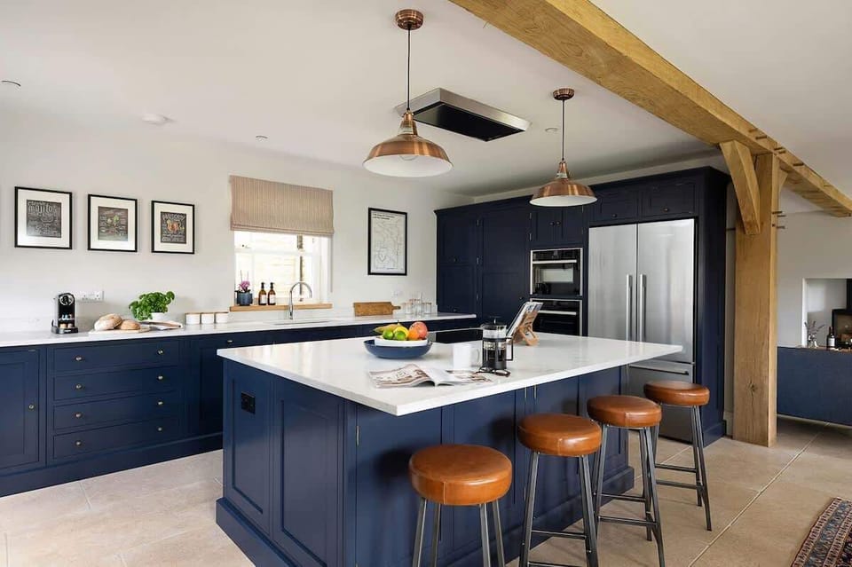 Spacious, fully equipped social kitchen and open plan dining area.  Dishwasher, 2 ovens, large fridge/freezer, induction hob