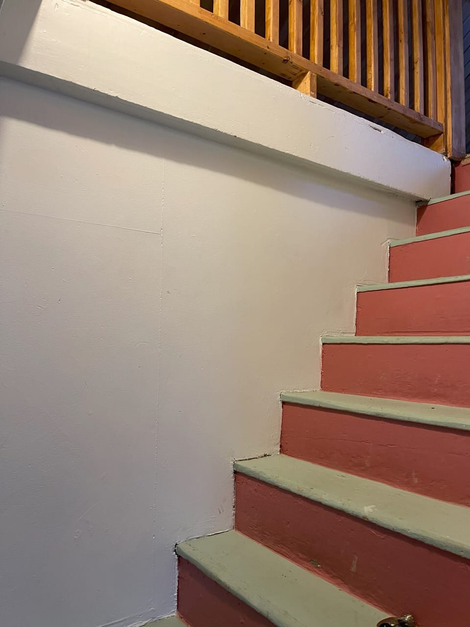 Steep stairs, grandfathered in from the 1800s.
