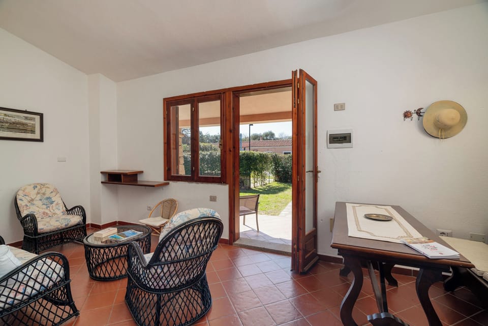 Apartment, Garden View | Living area | 35-inch TV with digital channels
