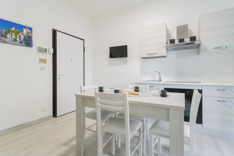 Apartment, Balcony | Living area | 35-inch TV with digital channels
