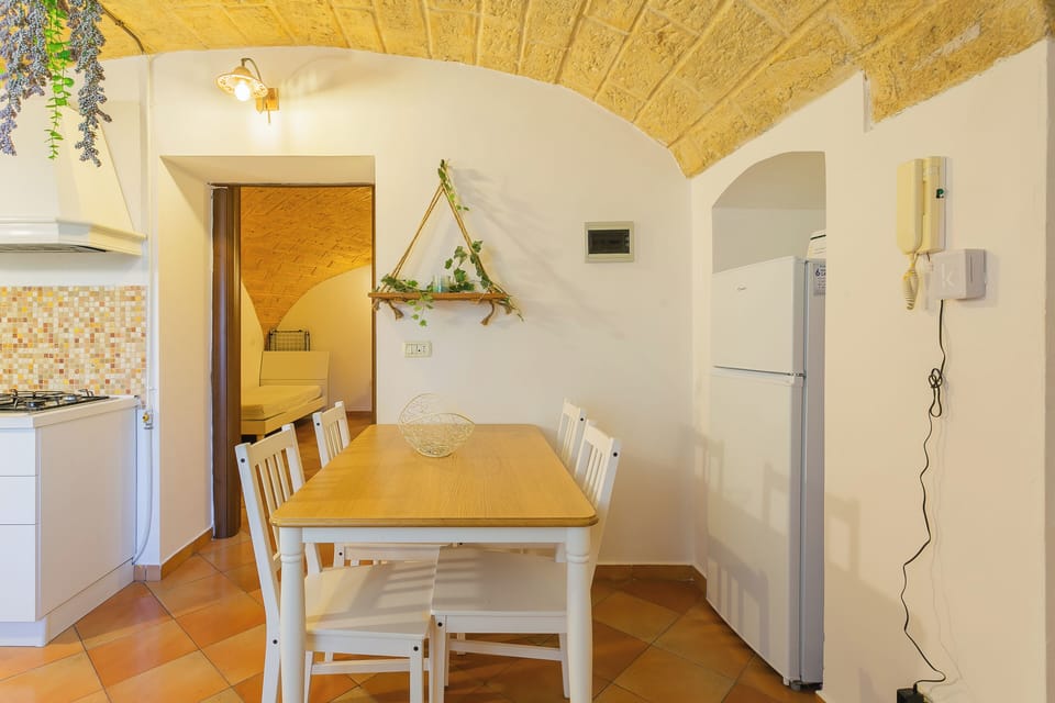 Apartment | Private kitchen | Electric kettle, dining tables