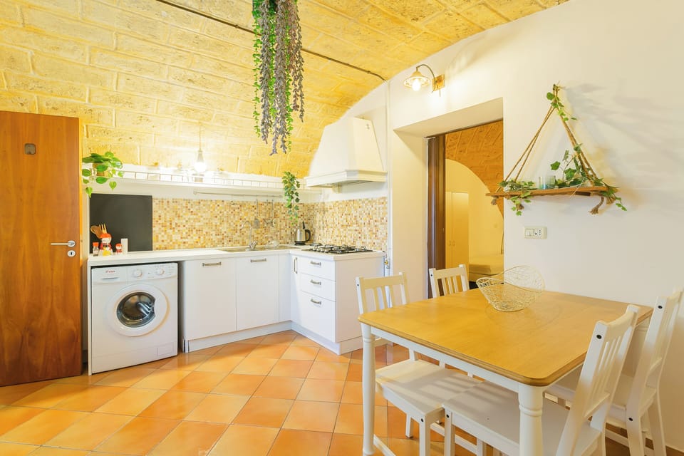 Apartment | Private kitchen | Electric kettle, dining tables
