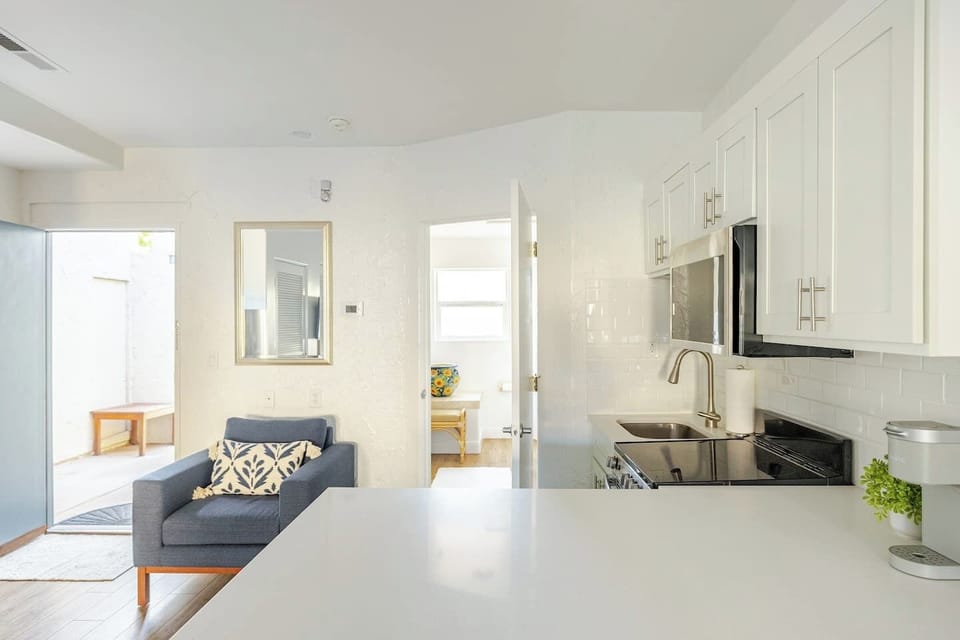 Living area and full kitchen.