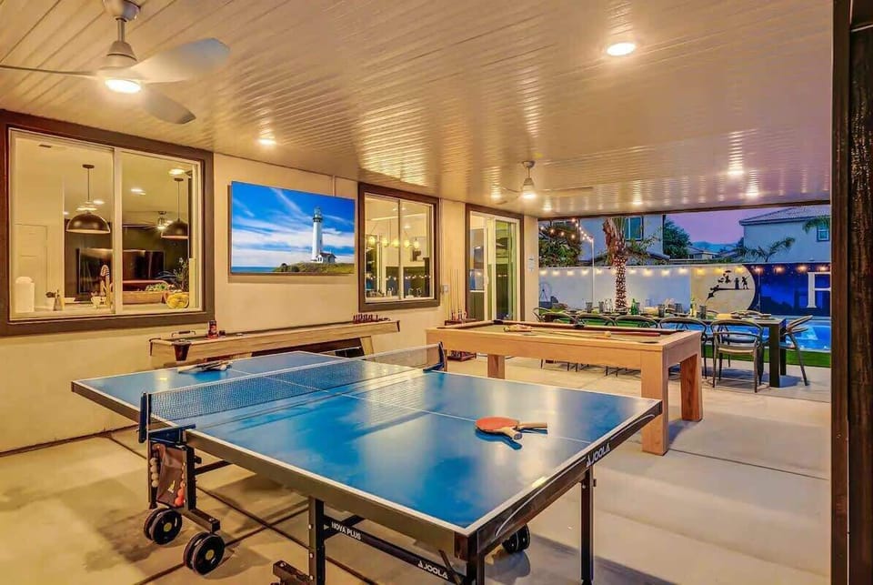 Whether you’re looking to unwind or spark a little friendly competition, this entertainment zone is perfect day or night—with cozy lighting and direct access to the pool and outdoor dining.