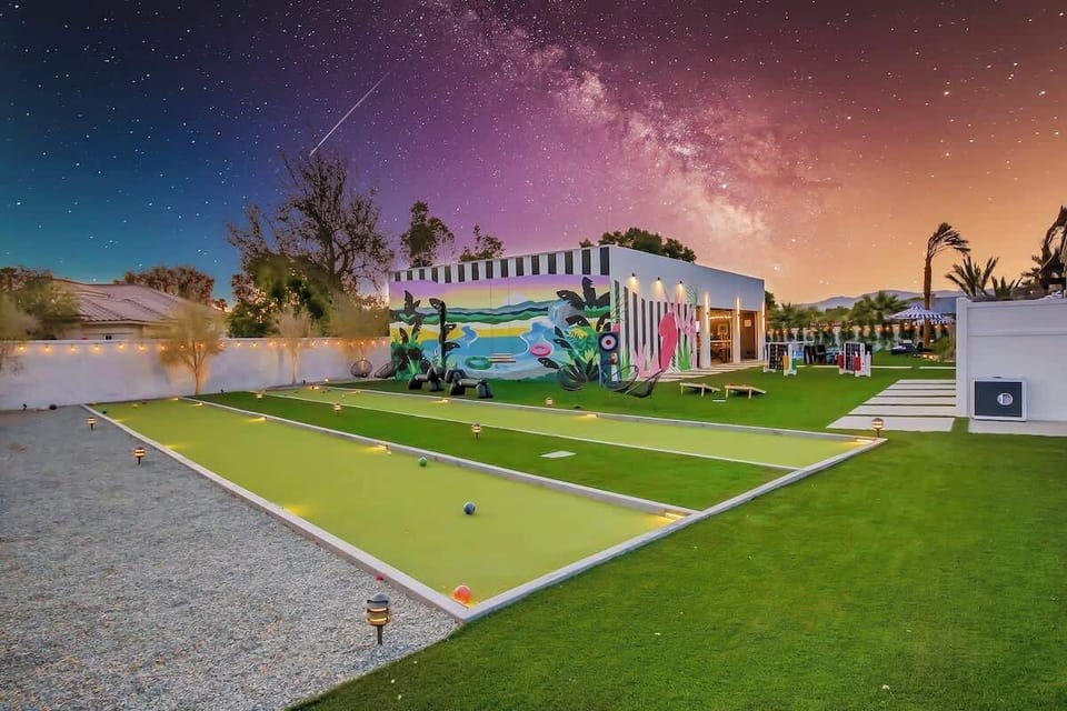 Challenge your guests to a friendly match on this beautifully lit bocce ball court.