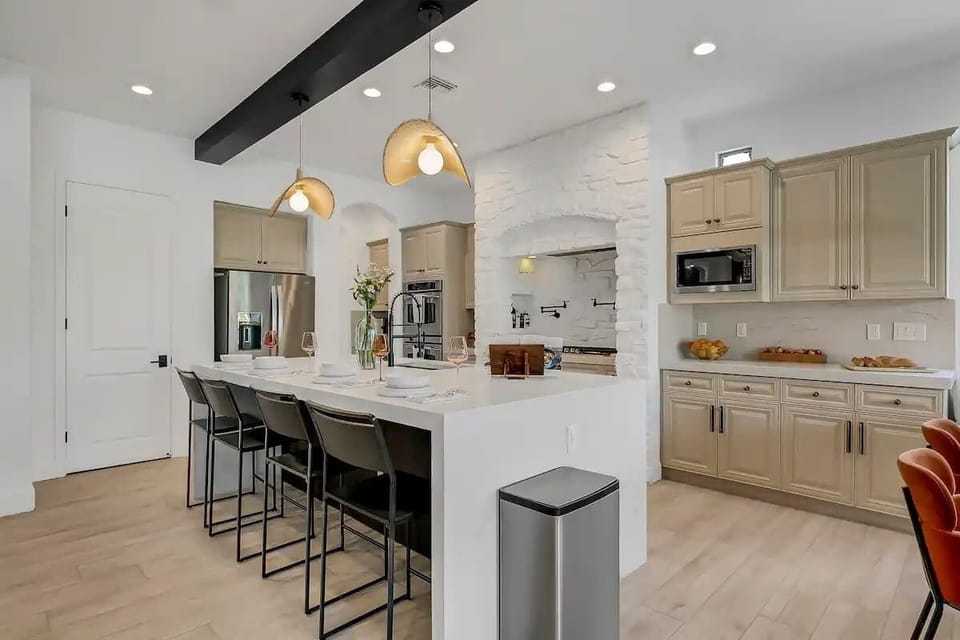 Modern design in this fully equipped gourmet kitchen.