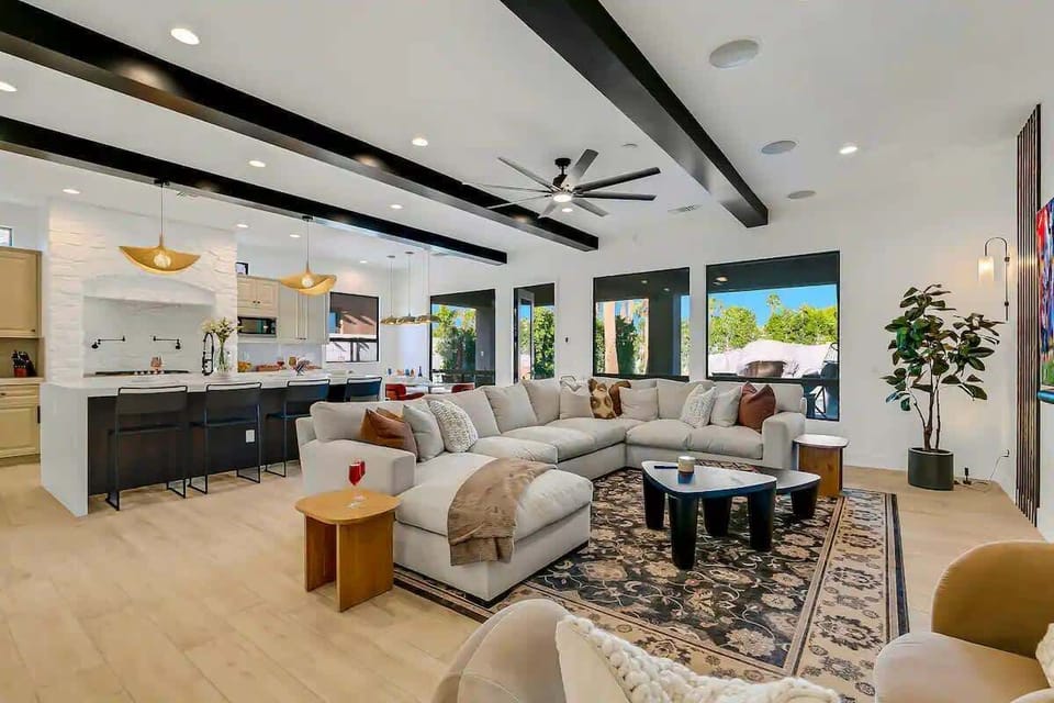 Bright and airy with a stunning open floor plan that seamlessly connects the living room, kitchen, and dining areas for effortless entertaining.