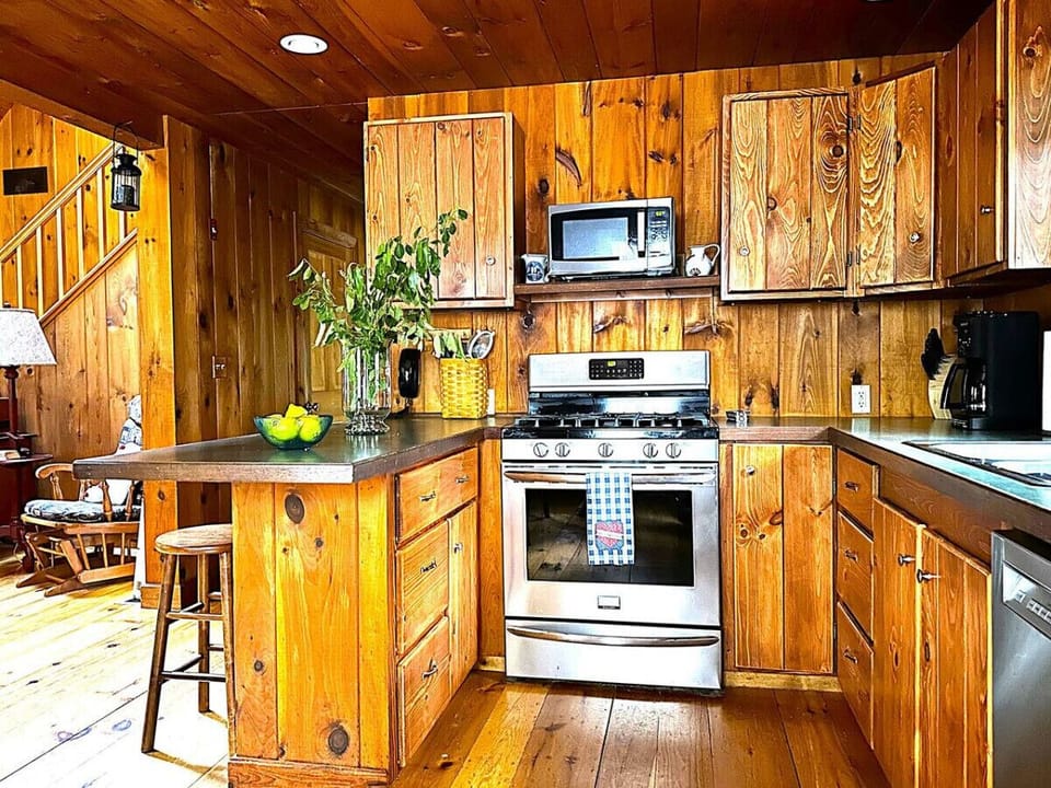 Recently refinished (by the very skilled homeowner) cabinetry. New appliances.