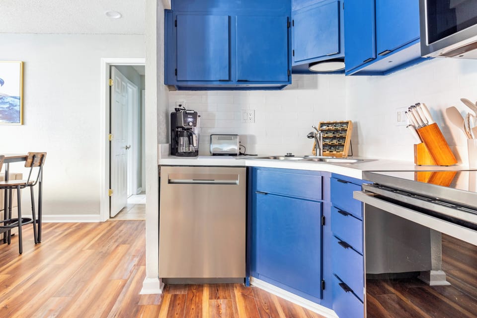 The kitchen is small but mighty with all the extras you need. 